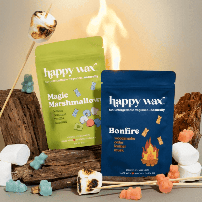 Happy Wax melts pouches on beige background with toasted marshmallows and wood
