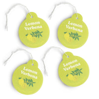 Four lime-green circular car charms with "Lemon Verbena" text, lemon and leaf illustrations, and white string attachments.