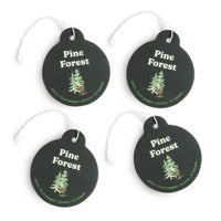 Four dark green round car charms with white string loops, each printed with "Pine Forest" text and a pine tree illustration.
