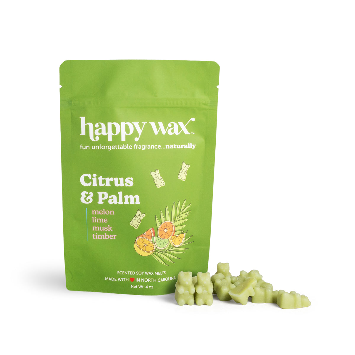 Green package of happy wax with scented wax melts on a white background