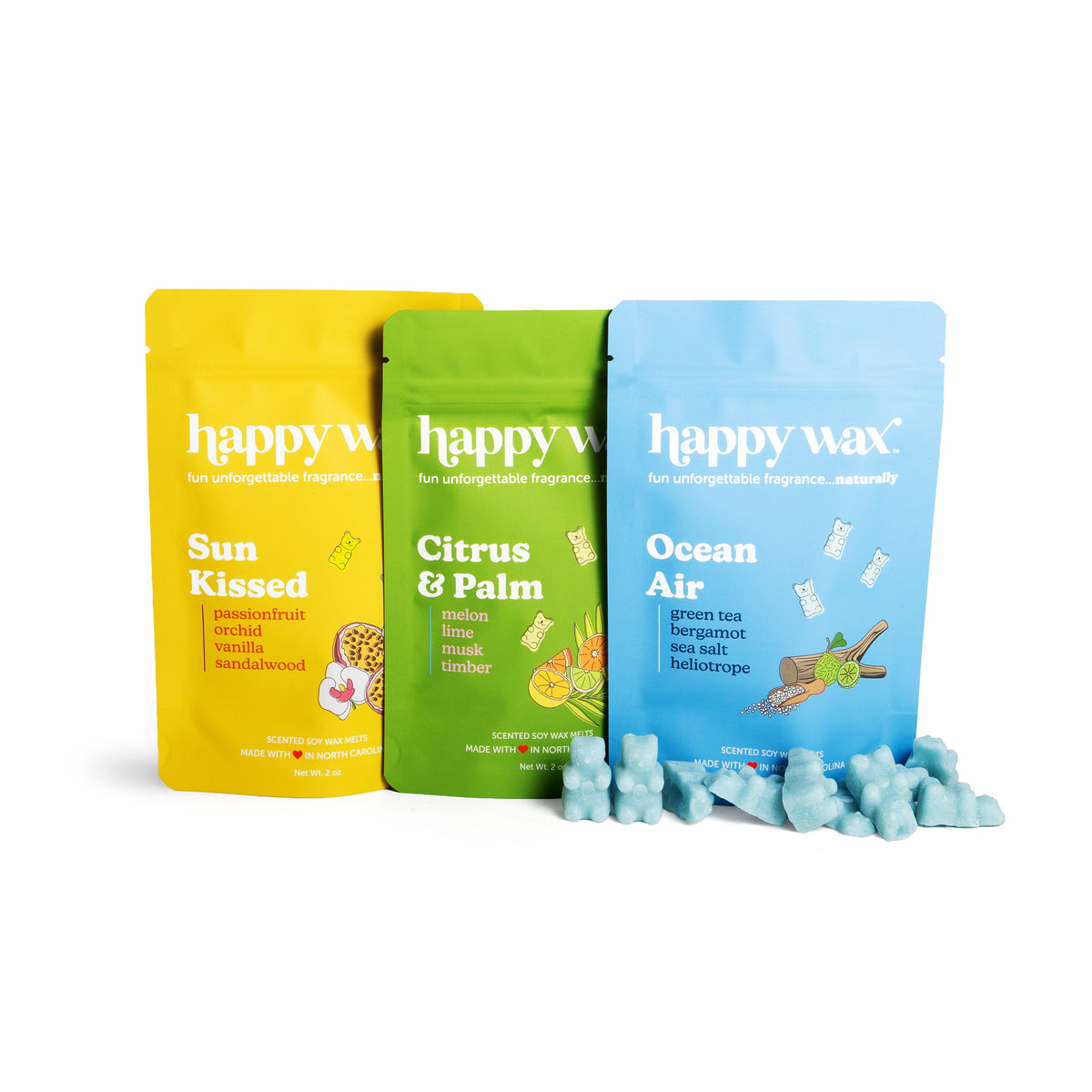 Three 'happy wax' wax melt packages on a white background