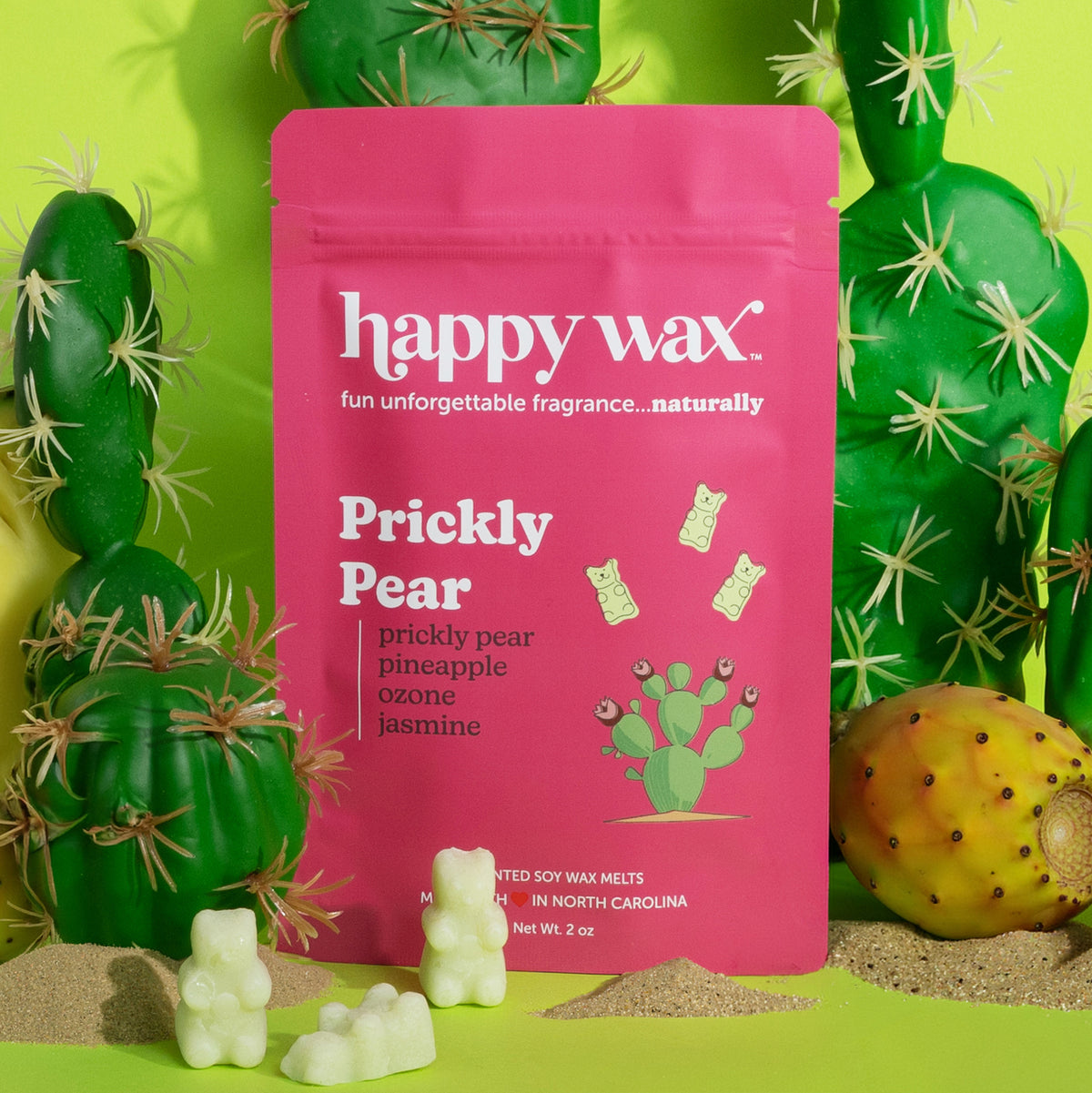 Happy Wax Prickly Pear wax melt package with decorative cacti and wax melt bears on a green background
