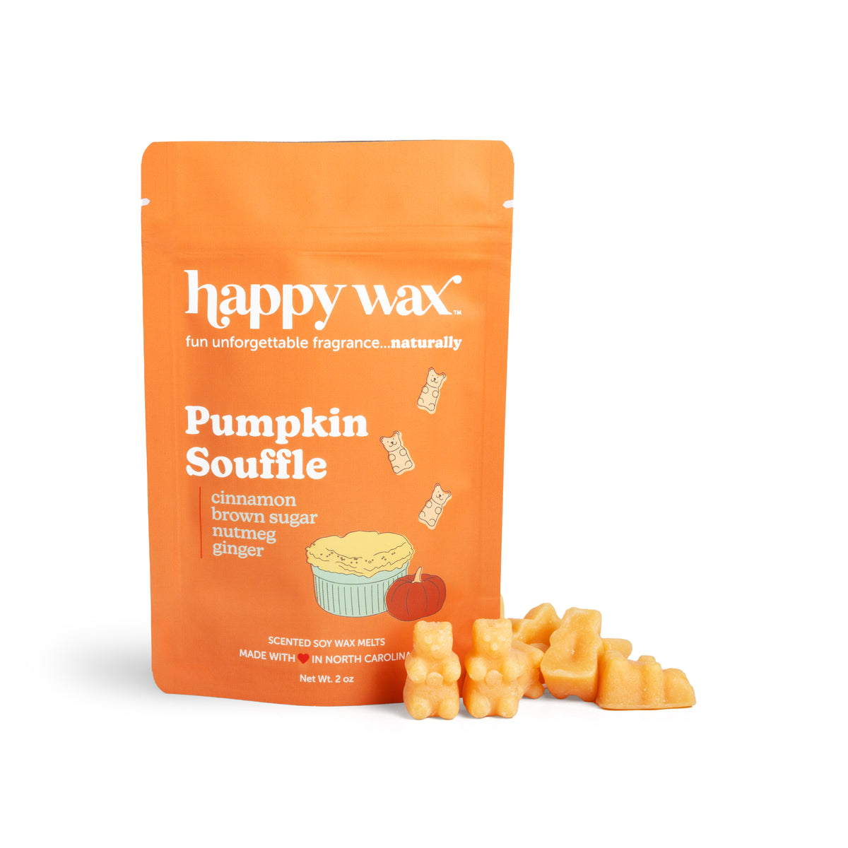 Orange pouch of Happy Wax pumpkin souffle wax melts with scattered yellow wax melts in front.