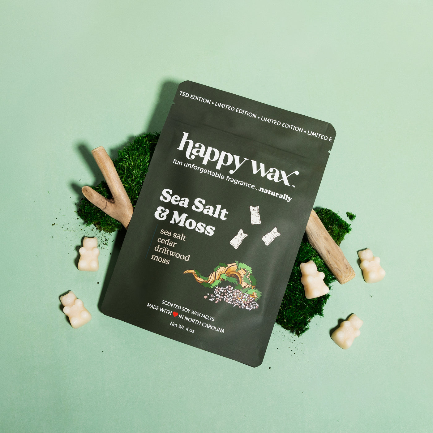 Happy Wax Sea Salt & Moss wax melts package on a green background