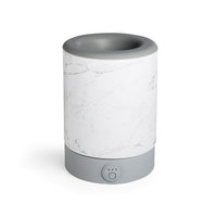 Signature wax warmer in marble on white background