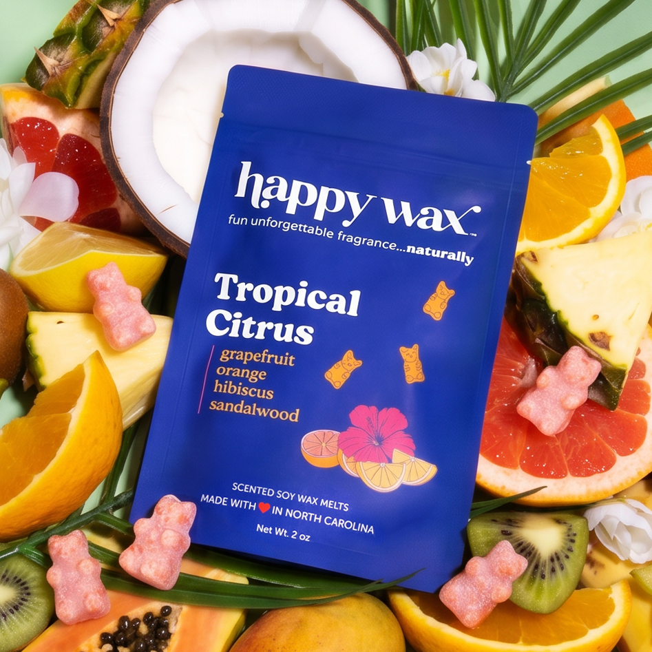 Happy Wax scented melts, Tropical Citrus, surrounded by tropical fruit