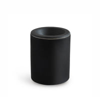 Black cylindrical wax warmer with rounded rim and hollow center opening.