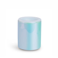 Cylindrical wax warmer with white top and turquoise ombre finish on body.