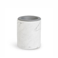 Cylindrical wax warmer with white marble texture and gray metal rim on top.