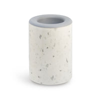 White speckled cylindrical wax warmer with gray rim and circular opening on top.