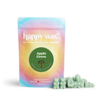 Pastel gradient pouch of Happy Wax Apple Grove soy wax melts with green wax chunks displayed beside it.