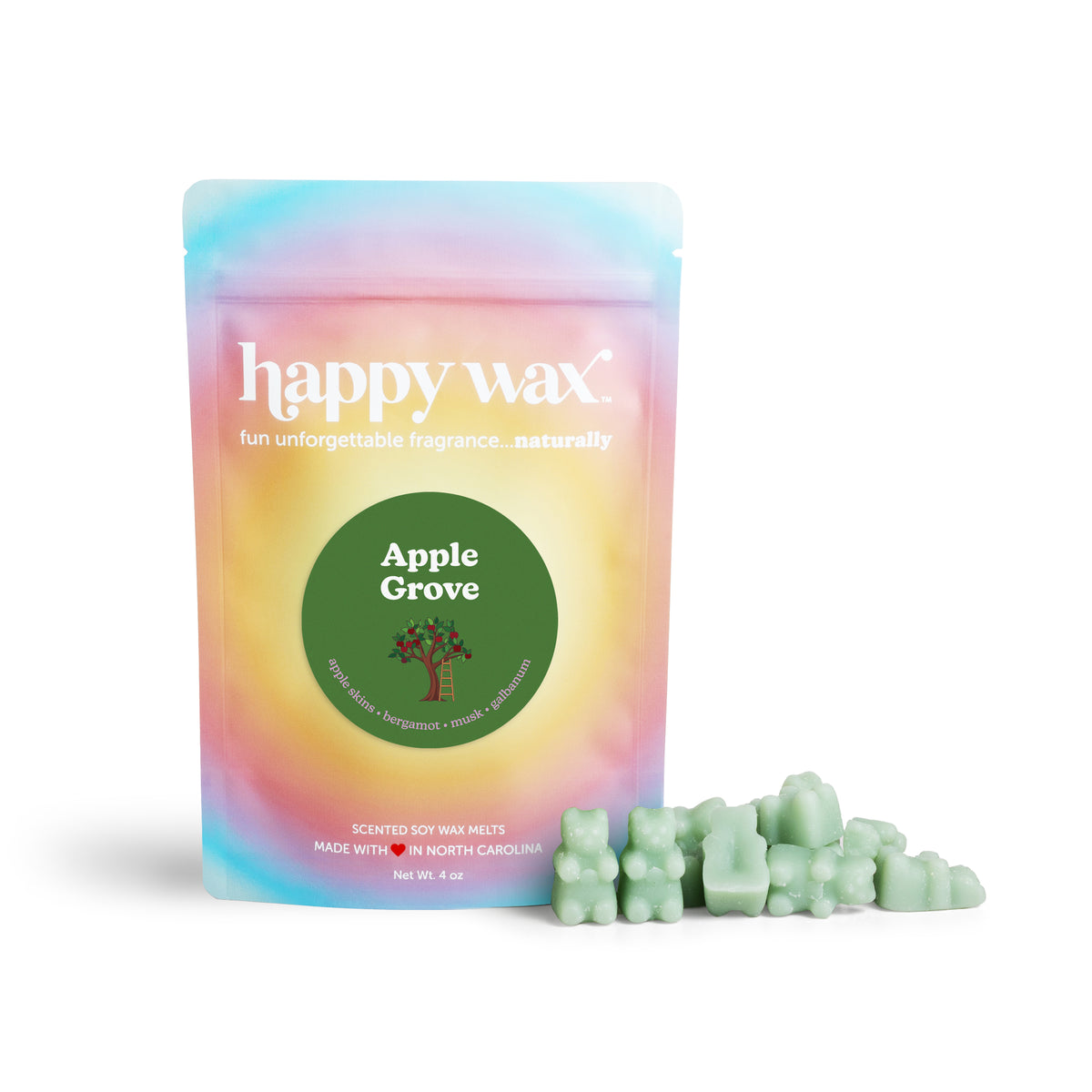 Pastel gradient pouch of Happy Wax Apple Grove soy wax melts with green wax chunks displayed beside it.