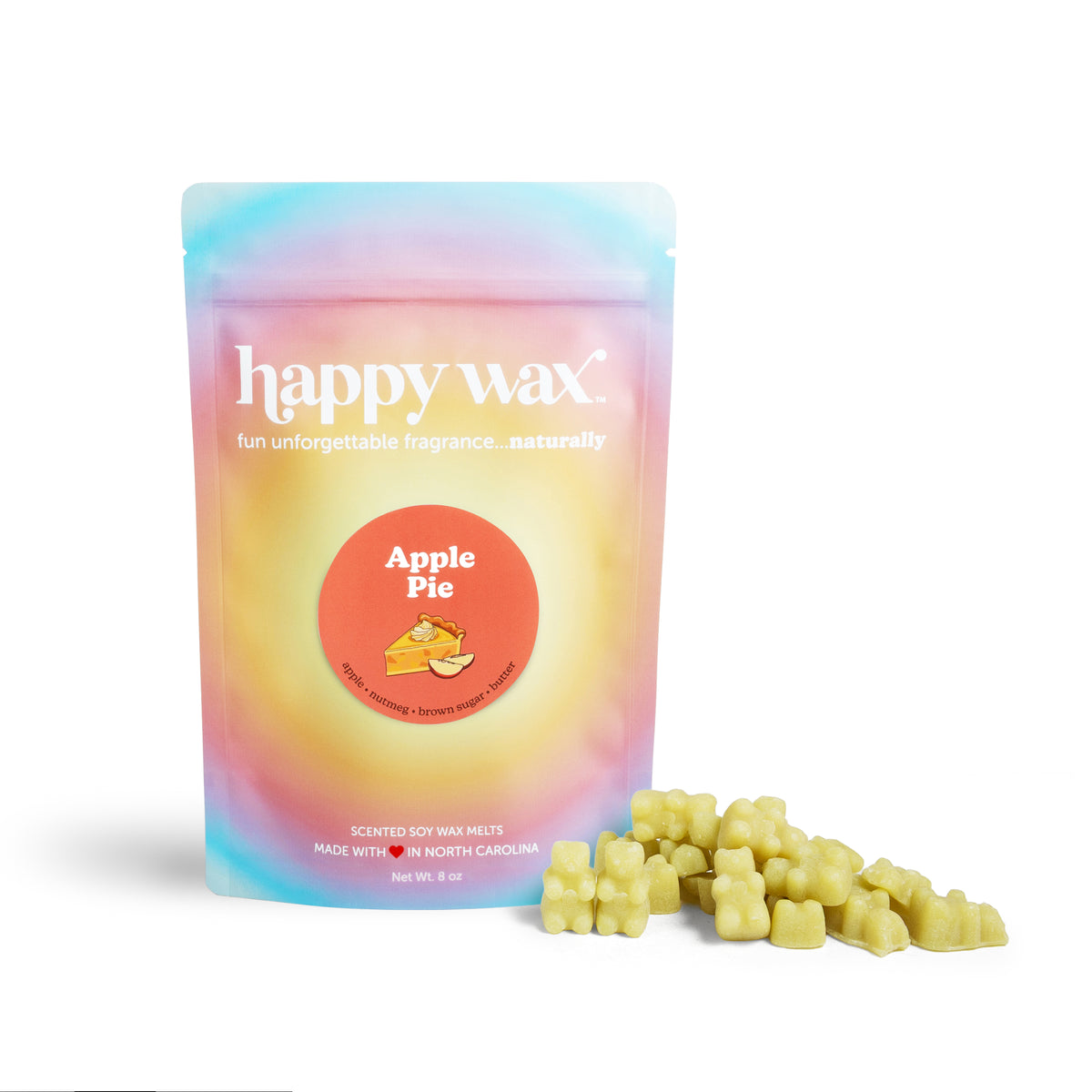 Pastel gradient pouch of happy wax brand soy wax melts with Apple Pie label, accompanied by ight green wax melt bears.