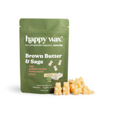 Green pouch of Happy Wax brand Brown Butter & Sage wax melts with cream-colored wax chunks displayed in front.