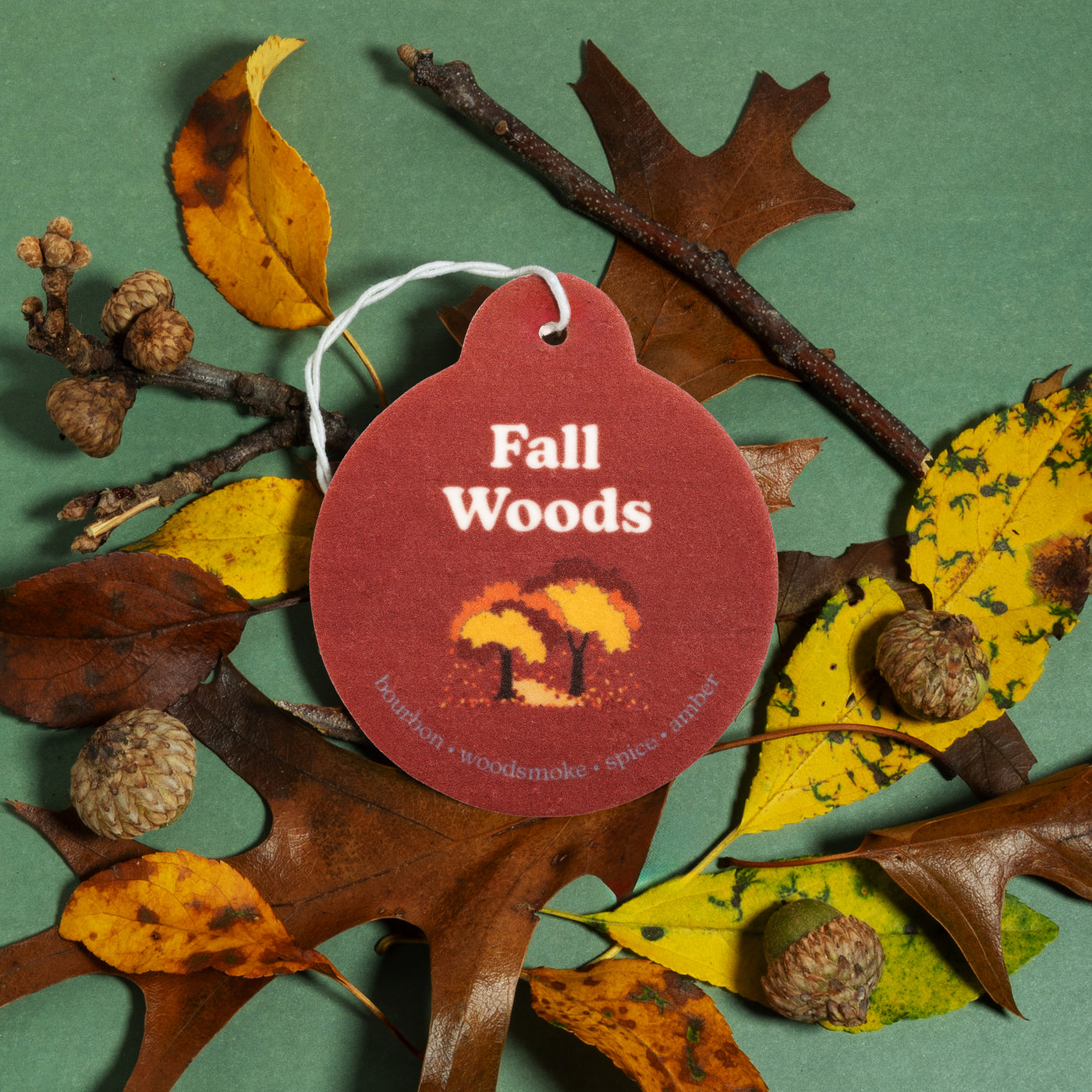 Happy Wax Fall Woods Car Charm with fall leaves and twigs on green background