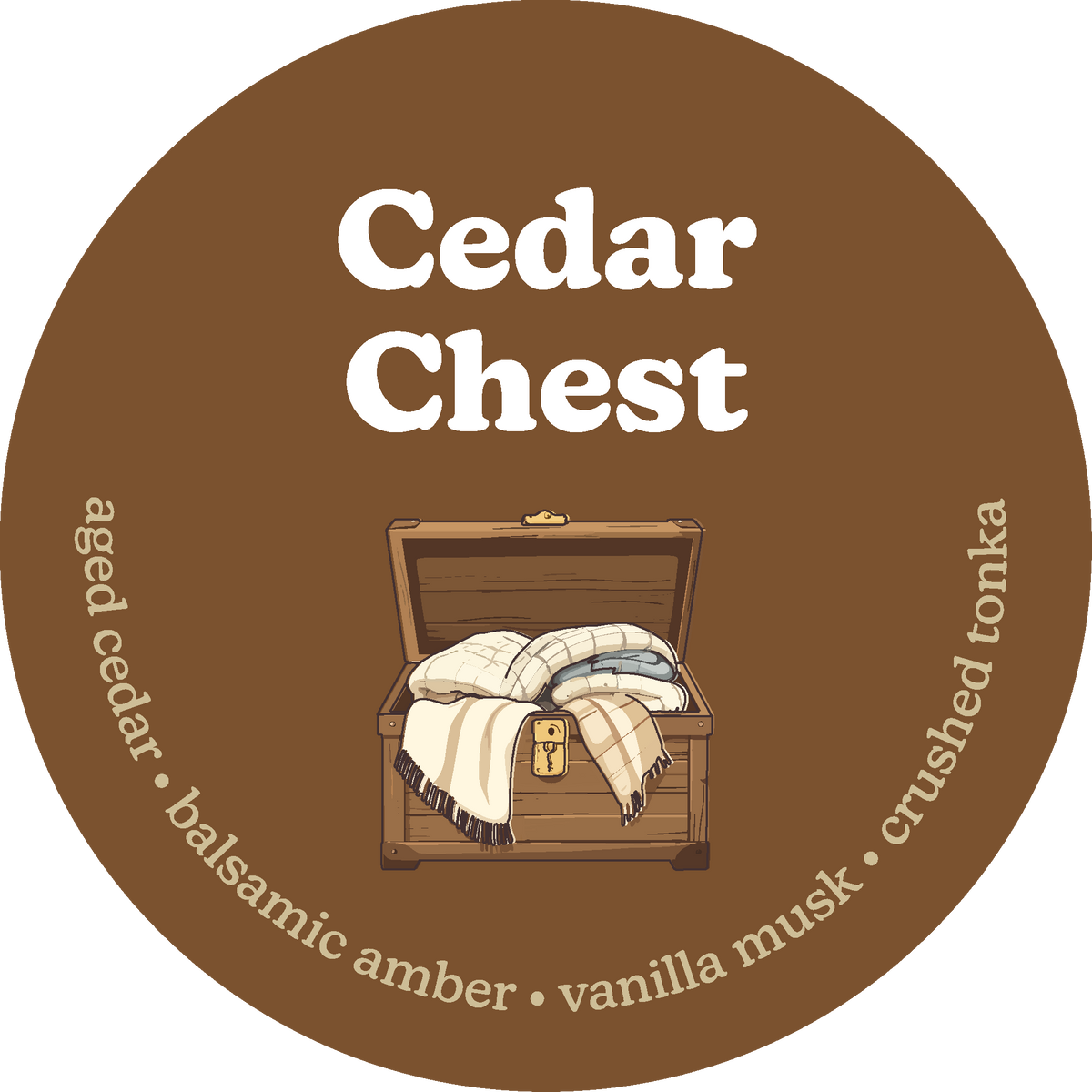 Round brown label for Cedar Chest wax melts featuring an illustrated wooden chest with folded blankets inside.
