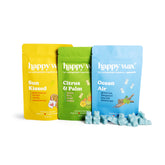 Three 'happy wax' wax melt packages on a white background