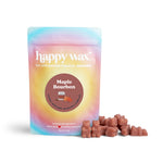 Brown wax melts next to a colorful gradient pouch labeled "Maple Bourbon" by Happy Wax.