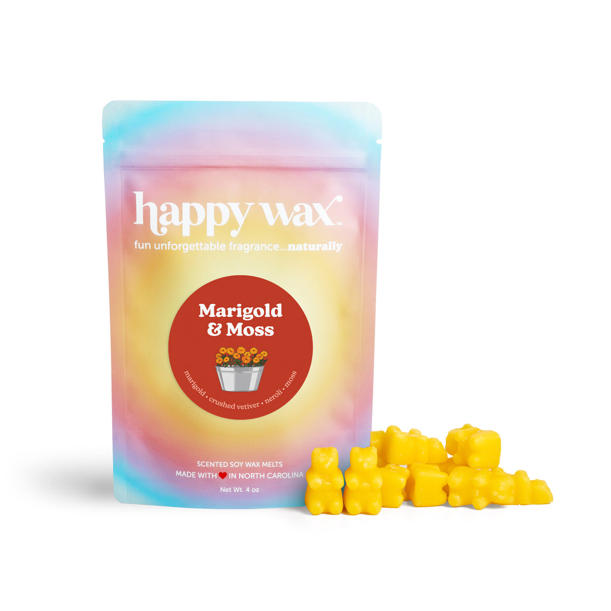 Package of happy wax Marigold & Moss scented soy wax melts with yellow wax melt pieces displayed beside it.