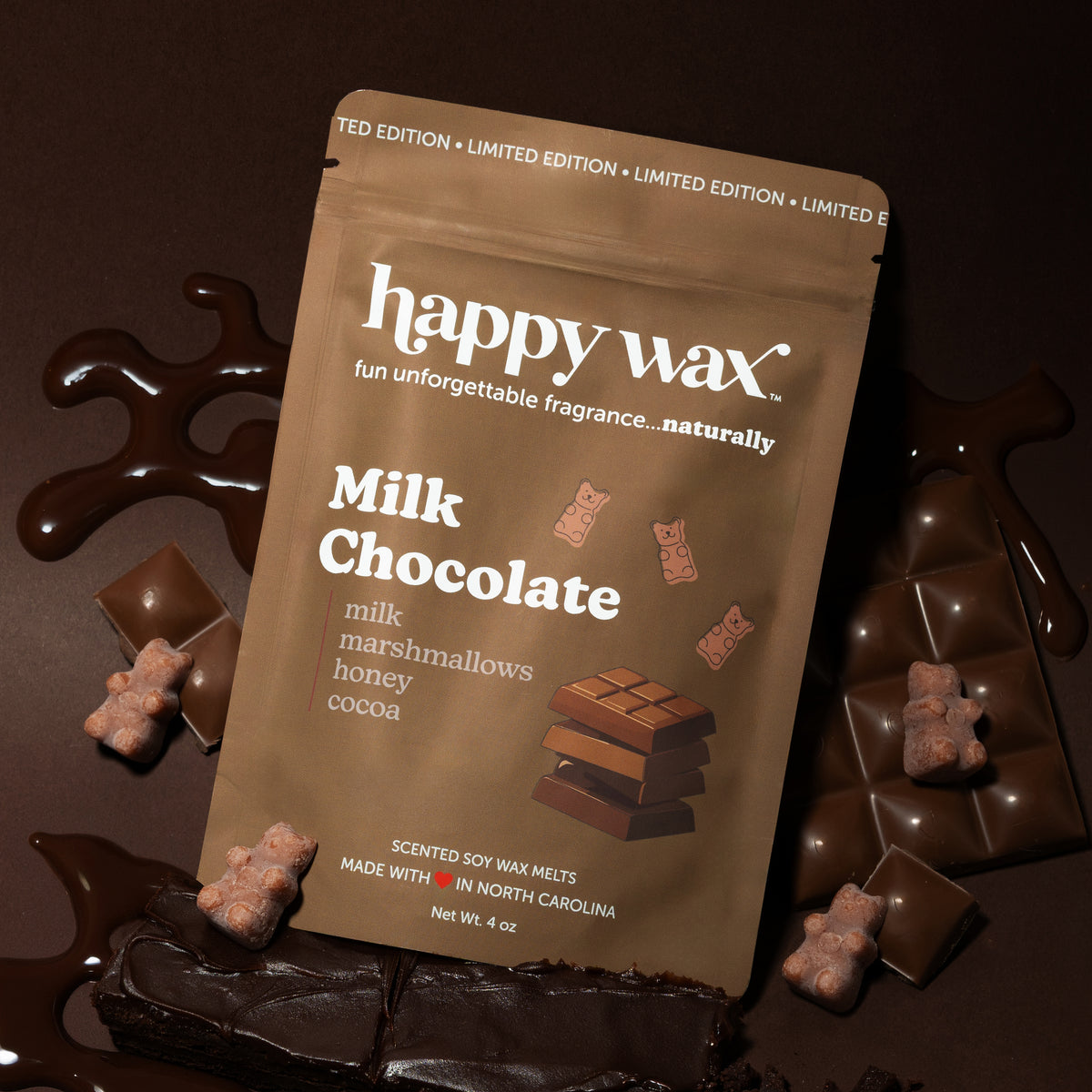 Happy Wax Milk Chocolate Pouch with brown wax bears, chocolate bar, chocolate sauce and chocolate cake on brown background
