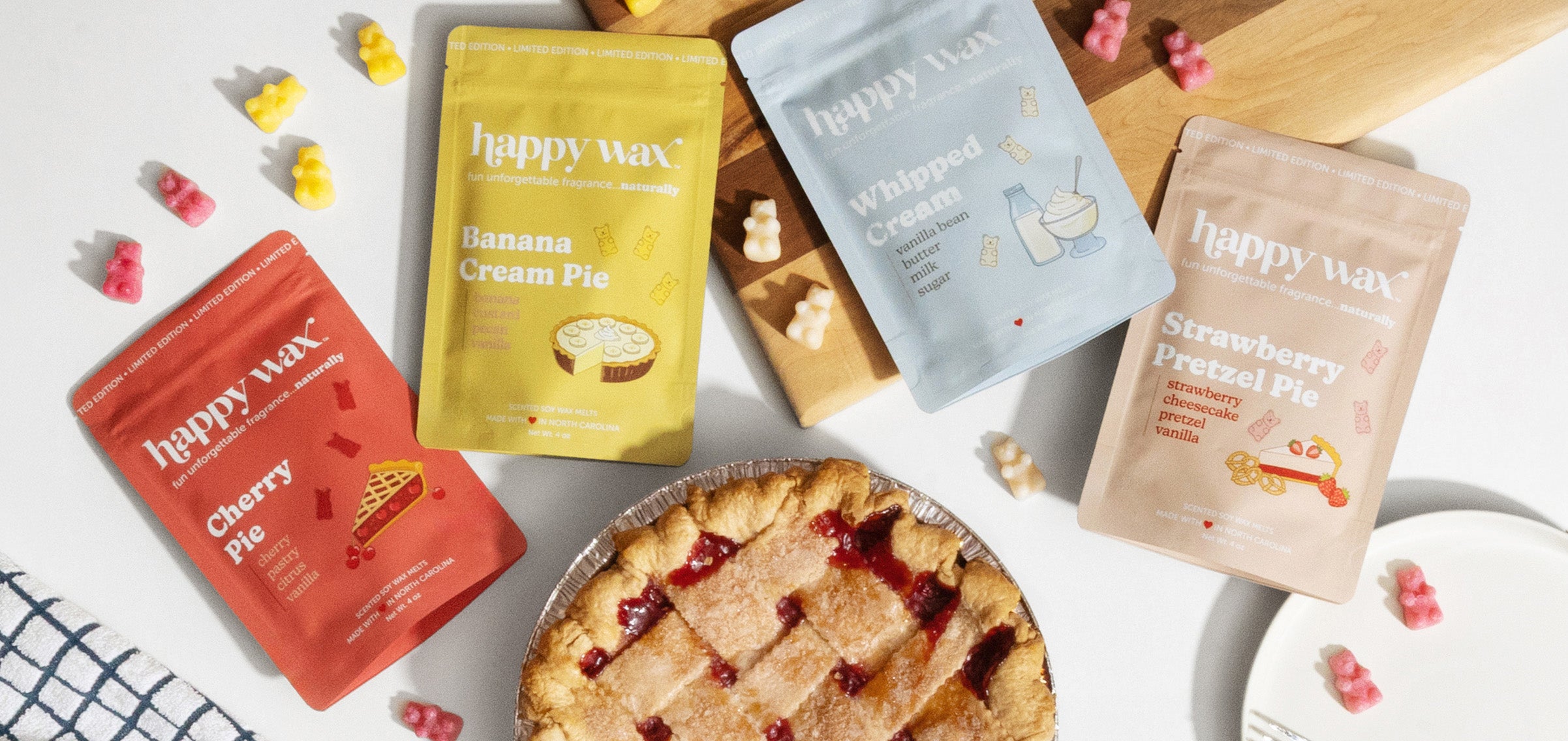 Happy Wax Pie Shop scented wax melt pouches on kitchen counter with cherry pie