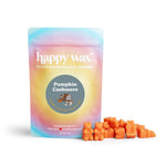 Colorful gradient pouch of soy wax melts with orange cube-shaped pieces displayed beside it.
