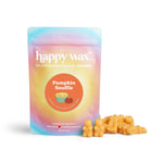 Pouch of happy wax brand pumpkin souffle soy wax melts with gradient packaging and orange wax pieces displayed beside it.