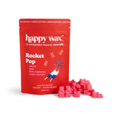Red Happy Wax packaging with pink wax melts on a white background