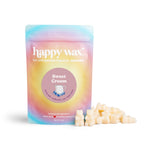 Pastel gradient pouch of Sweet Cream wax melts with cream-colored wax pieces displayed beside the package.