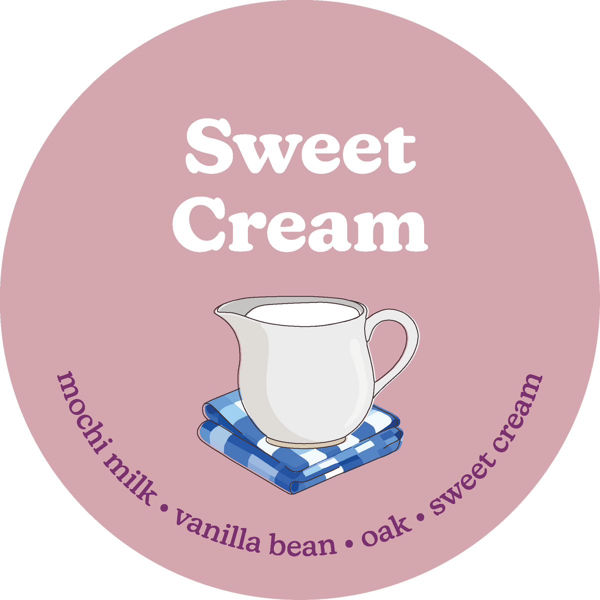 Round pink label with "Sweet Cream" text and white pitcher illustration on blue checkered cloth.