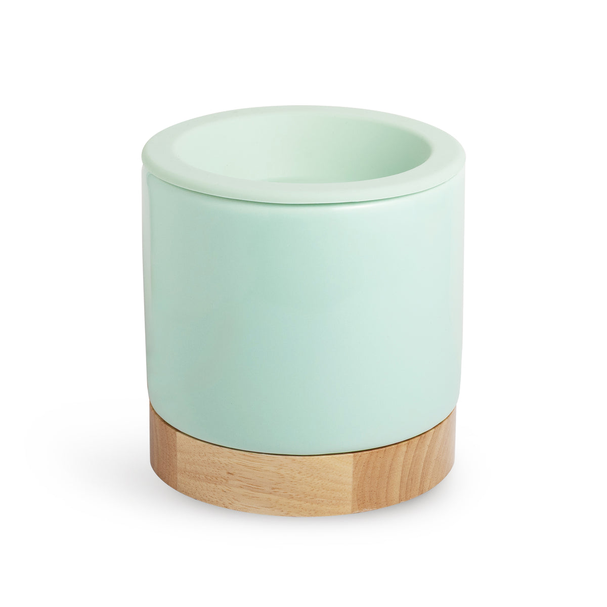 Seafoam green blue wax warmer with wood base on white background