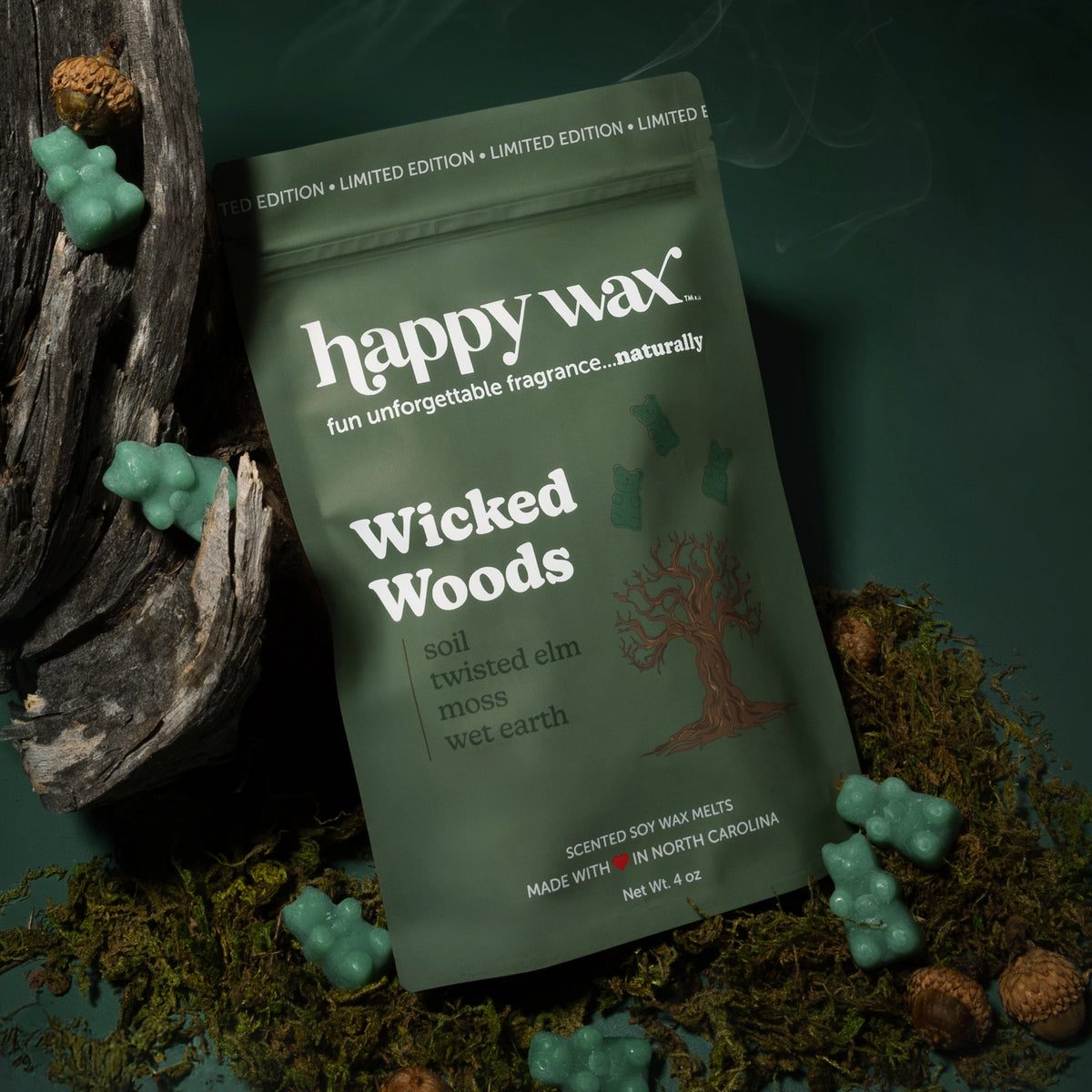 Happy Wax Wicked Woods Pouch with green wax bears, wood, moss and acorns on dark green background